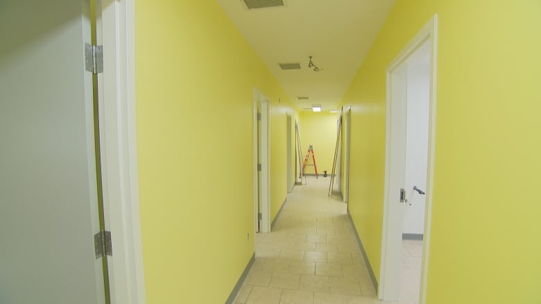 Hallway with yellow walls